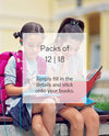 School girls sitting with bags and school books