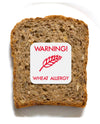 Piece of bread with wheat allergy sticker